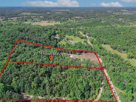 10 Acres of Recreational Land with Home for Sale in Brumley, Missouri