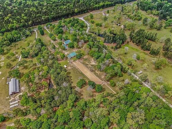 8.99 Acres of Land with Home for Sale in Huntsville, Texas