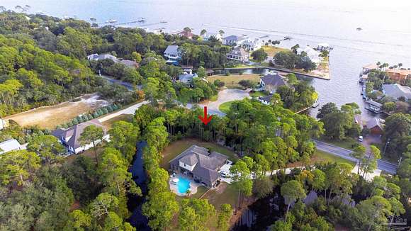 2.633 Acres of Residential Land with Home for Sale in Gulf Breeze, Florida