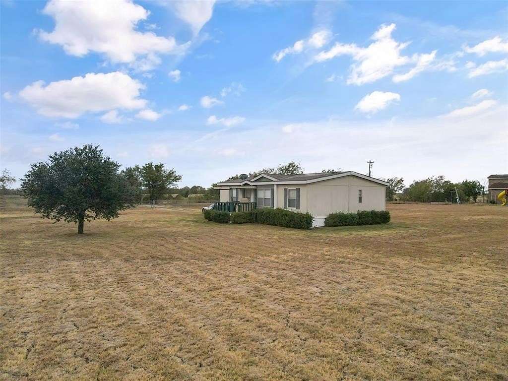 3.01 Acres of Residential Land with Home for Sale in Royse City, Texas