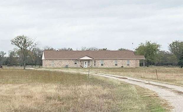 7 Acres of Residential Land with Home for Sale in Quinlan, Texas