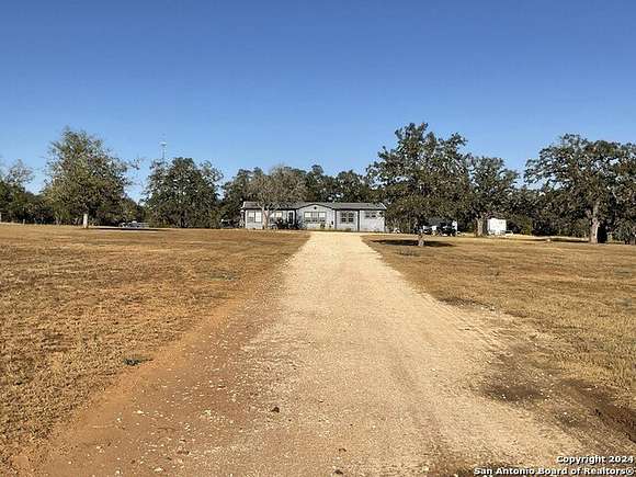 5.07 Acres of Residential Land with Home for Sale in Stockdale, Texas