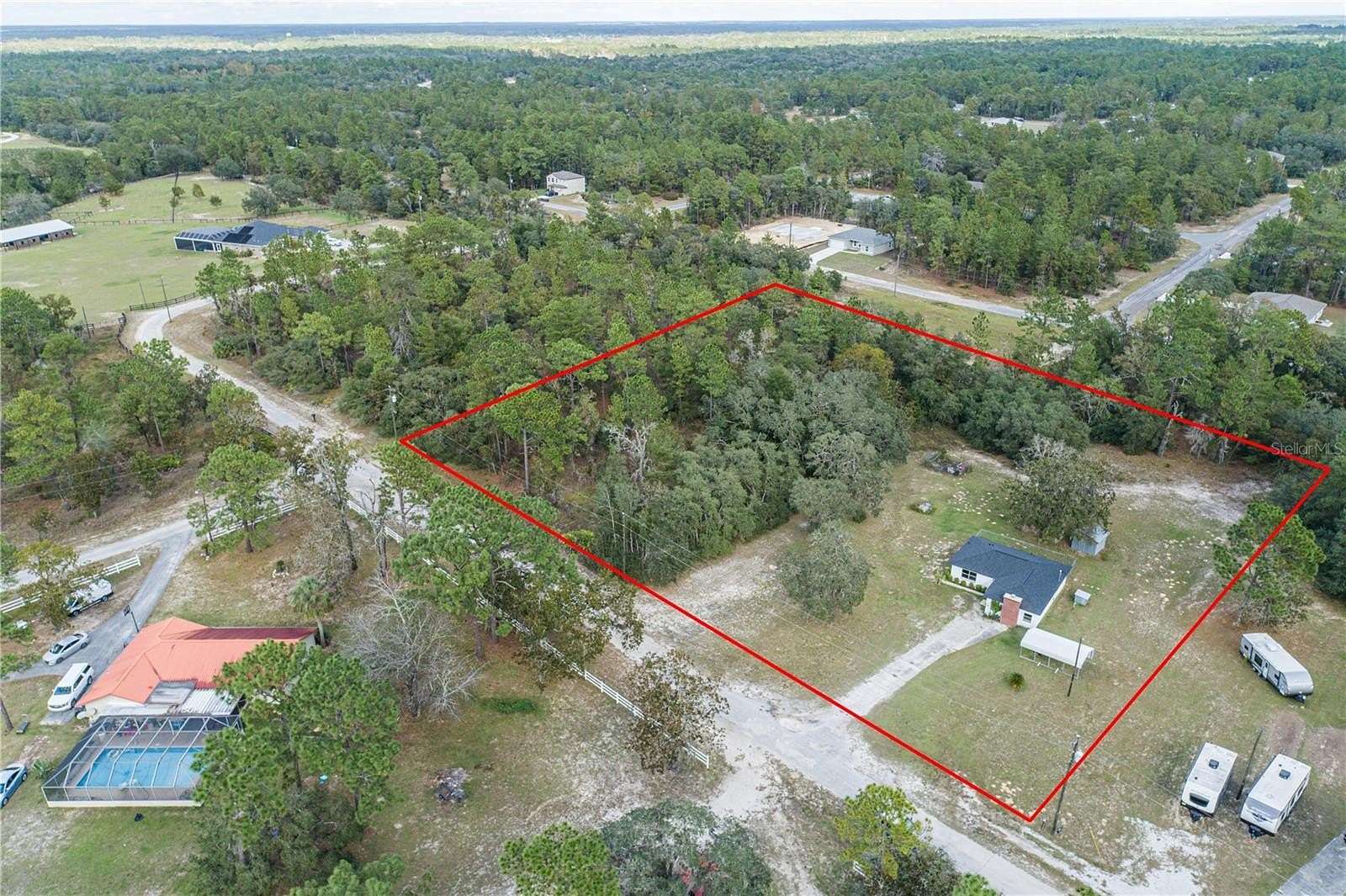 2.38 Acres of Residential Land with Home for Sale in Dunnellon, Florida