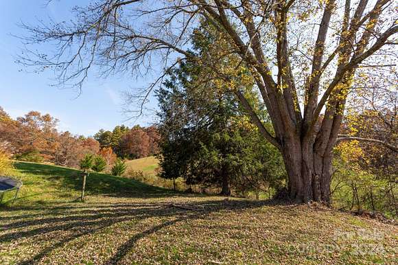 7.61 Acres of Land with Home for Sale in Weaverville, North Carolina