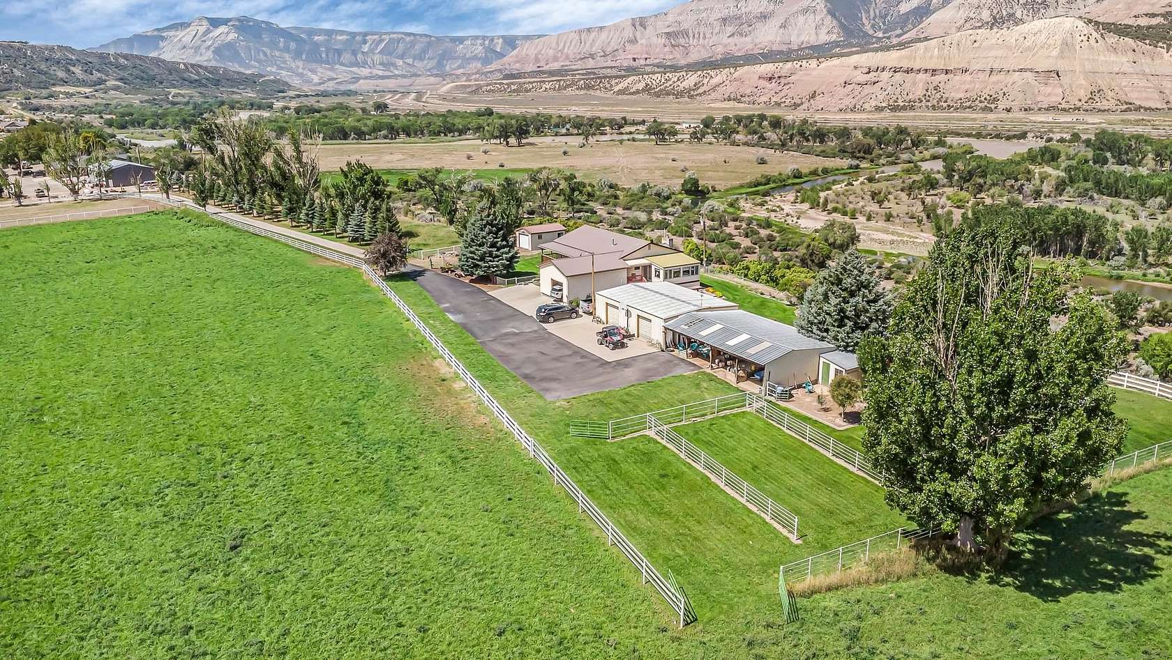 14.66 Acres of Land with Home for Sale in Parachute, Colorado