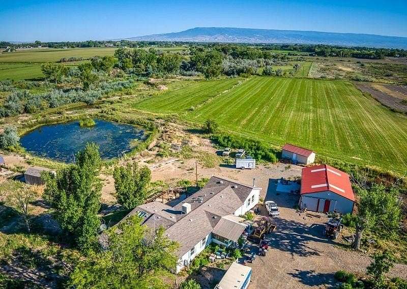 46.6 Acres of Agricultural Land with Home for Sale in Olathe, Colorado