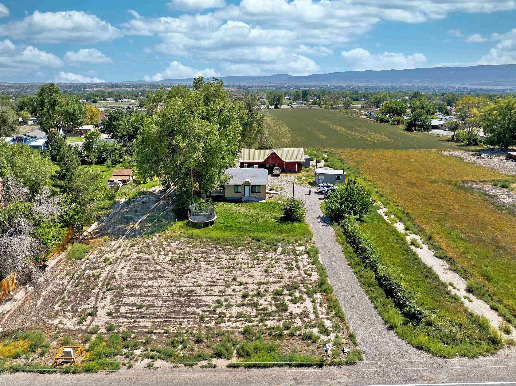 4.8 Acres of Residential Land with Home for Sale in Grand Junction, Colorado