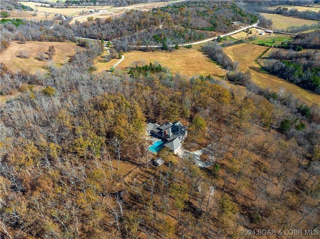 98 Acres of Land with Home for Sale in Camdenton, Missouri