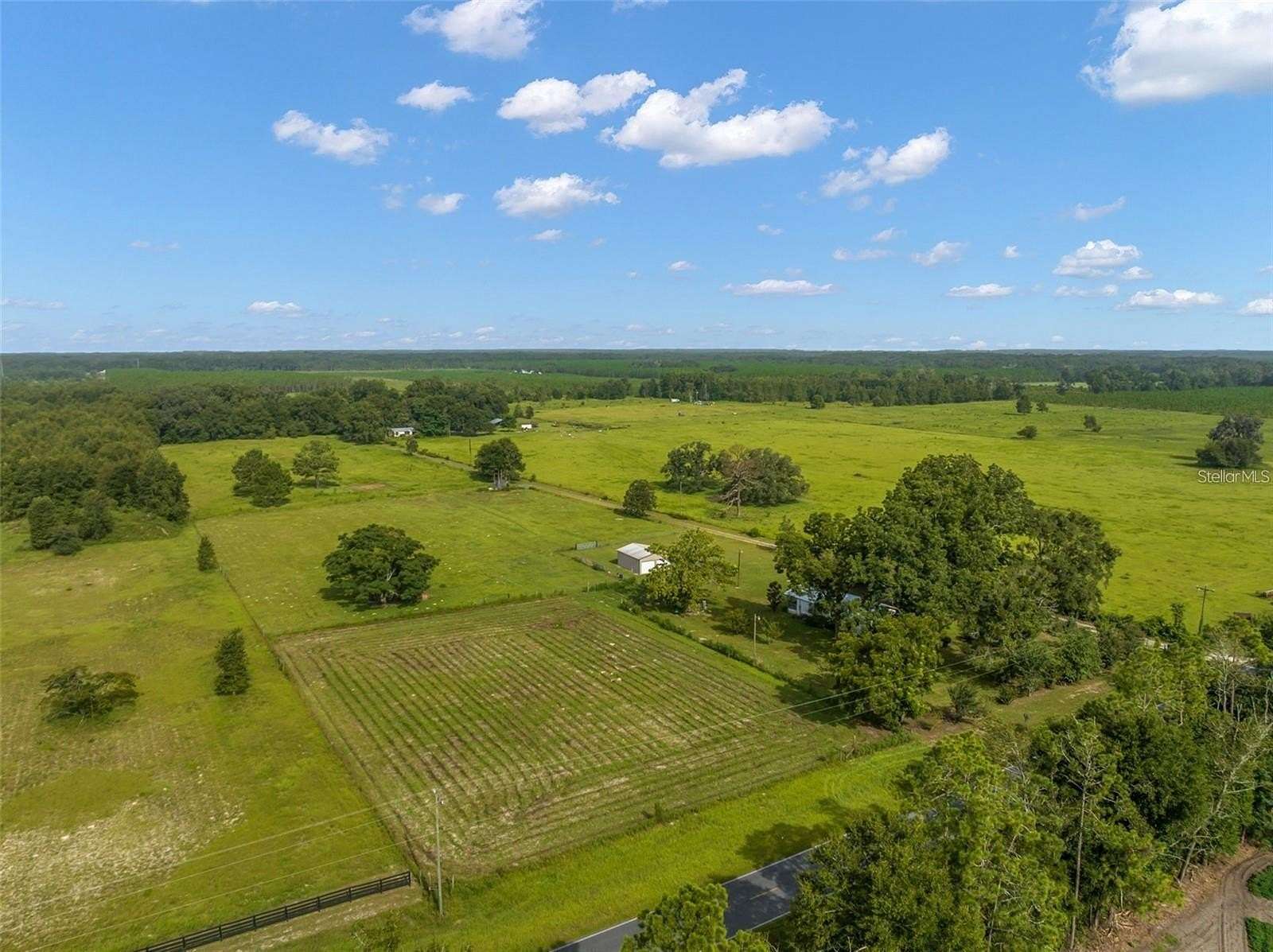 12 Acres of Land with Home for Sale in O'Brien, Florida