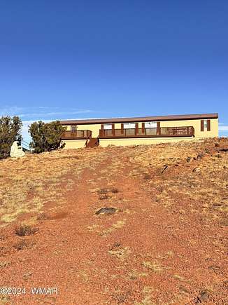 37.94 Acres of Recreational Land with Home for Sale in Concho, Arizona