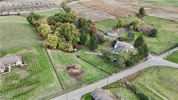 7.8 Acres of Residential Land with Home for Auction in Beach City, Ohio