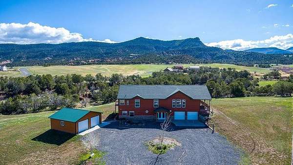 4 Acres of Residential Land with Home for Sale in Collbran, Colorado