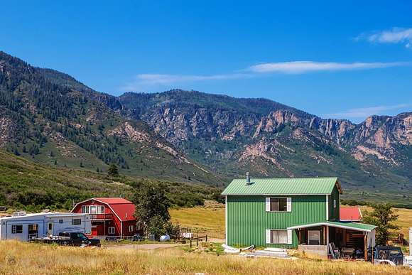 140 Acres of Land with Home for Sale in Whitewater, Colorado