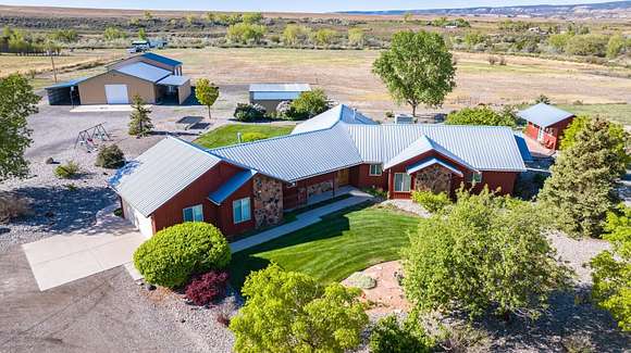 35 Acres of Agricultural Land with Home for Sale in Whitewater, Colorado