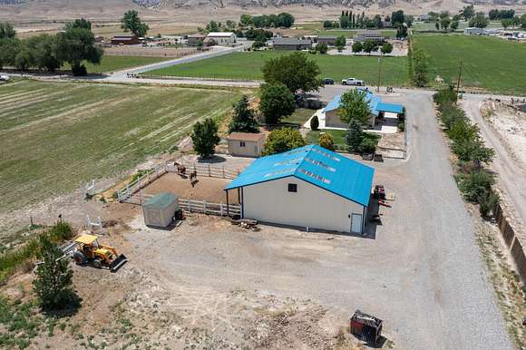 14.54 Acres of Land with Home for Sale in Loma, Colorado