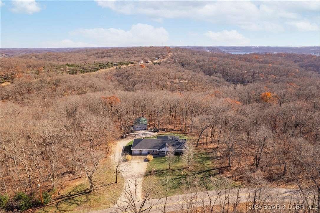 5 Acres of Residential Land with Home for Sale in Lake Ozark, Missouri