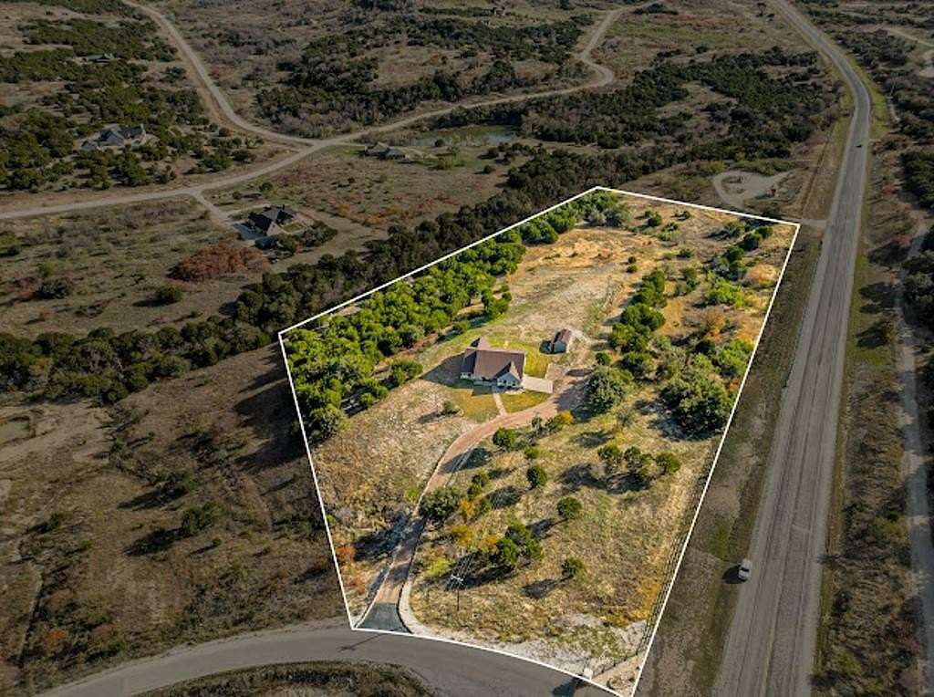 8.3 Acres of Residential Land with Home for Sale in Graford, Texas