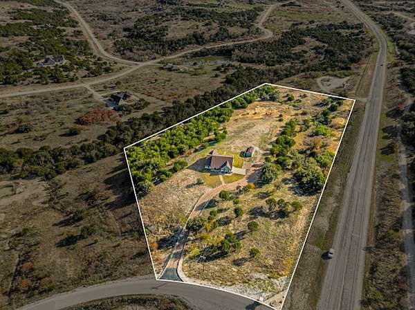 8.3 Acres of Land with Home for Sale in Graford, Texas