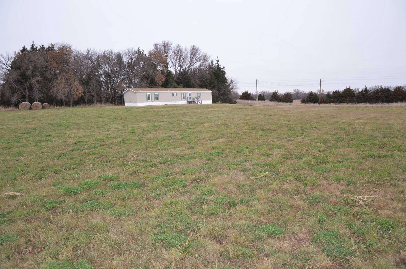 3.4 Acres of Residential Land with Home for Sale in Ord, Nebraska