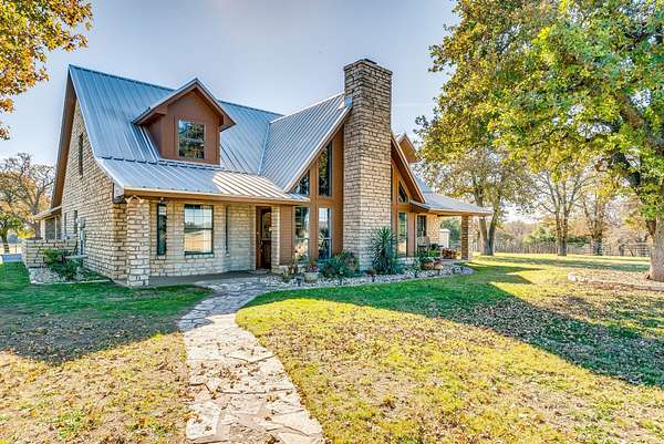 71 Acres of Agricultural Land with Home for Sale in Stephenville, Texas