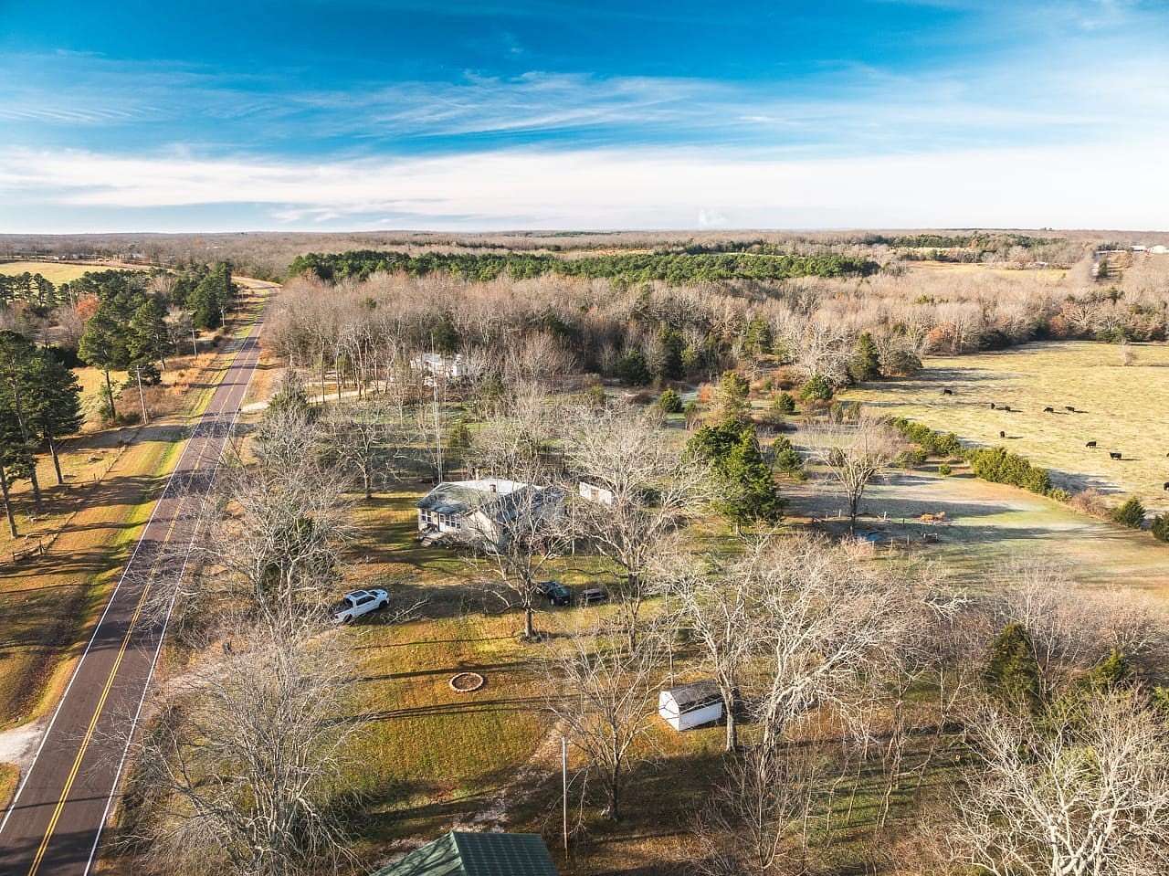 5.6 Acres of Residential Land with Home for Sale in Lenox, Missouri