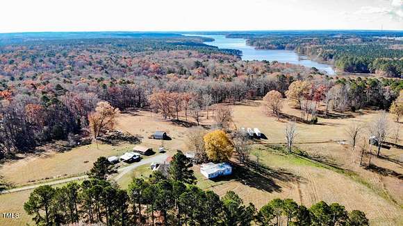 51.52 Acres of Agricultural Land with Home for Sale in New Hill, North Carolina