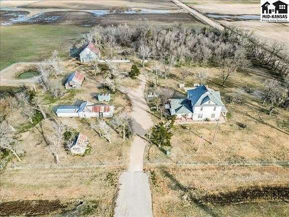 5.63 Acres of Residential Land with Home for Sale in Burrton, Kansas