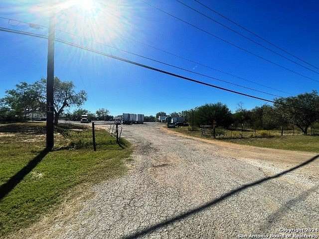 6.45 Acres of Land with Home for Sale in Adkins, Texas