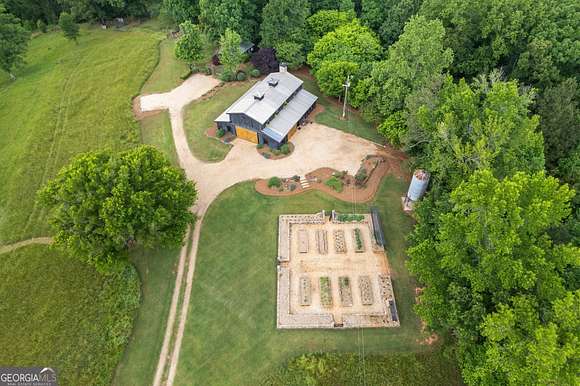 47.66 Acres of Agricultural Land with Home for Sale in Locust Grove, Georgia