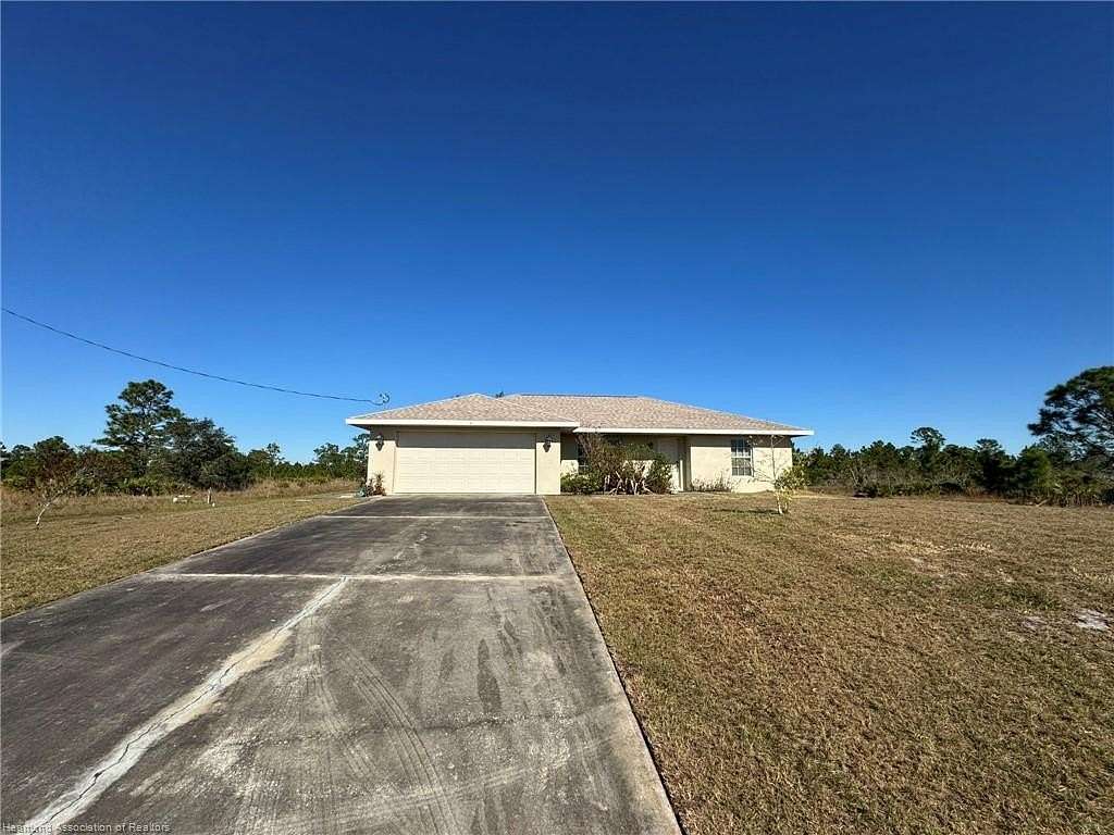 10.97 Acres of Recreational Land with Home for Sale in Venus, Florida