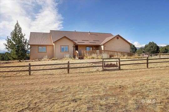 35.2 Acres of Land with Home for Sale in Texas Creek, Colorado