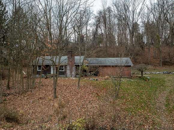 10.5 Acres of Land with Home for Sale in Jeannette, Pennsylvania