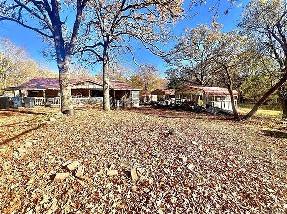 2.62 Acres of Residential Land with Home for Sale in Tahlequah, Oklahoma