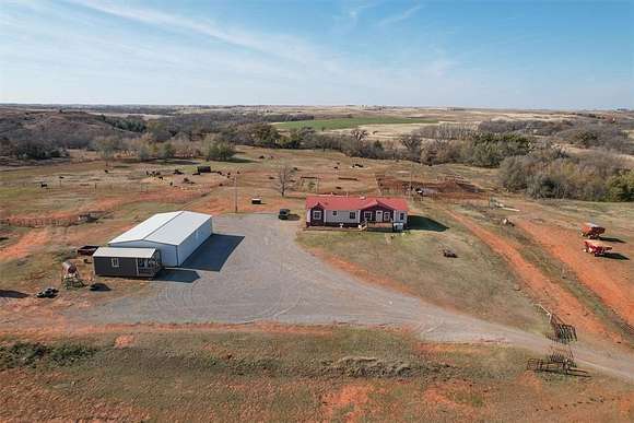 5 Acres of Residential Land with Home for Sale in Canute, Oklahoma