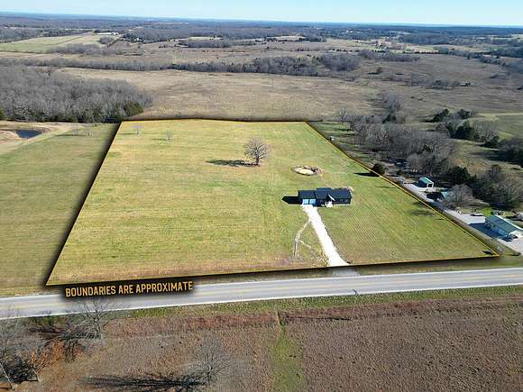 9.5 Acres of Land with Home for Sale in Hartville, Missouri