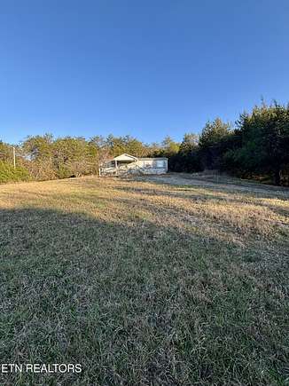 9.18 Acres of Residential Land with Home for Sale in Kodak, Tennessee