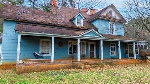 11.9 Acres of Land with Home for Sale in Sylva, North Carolina