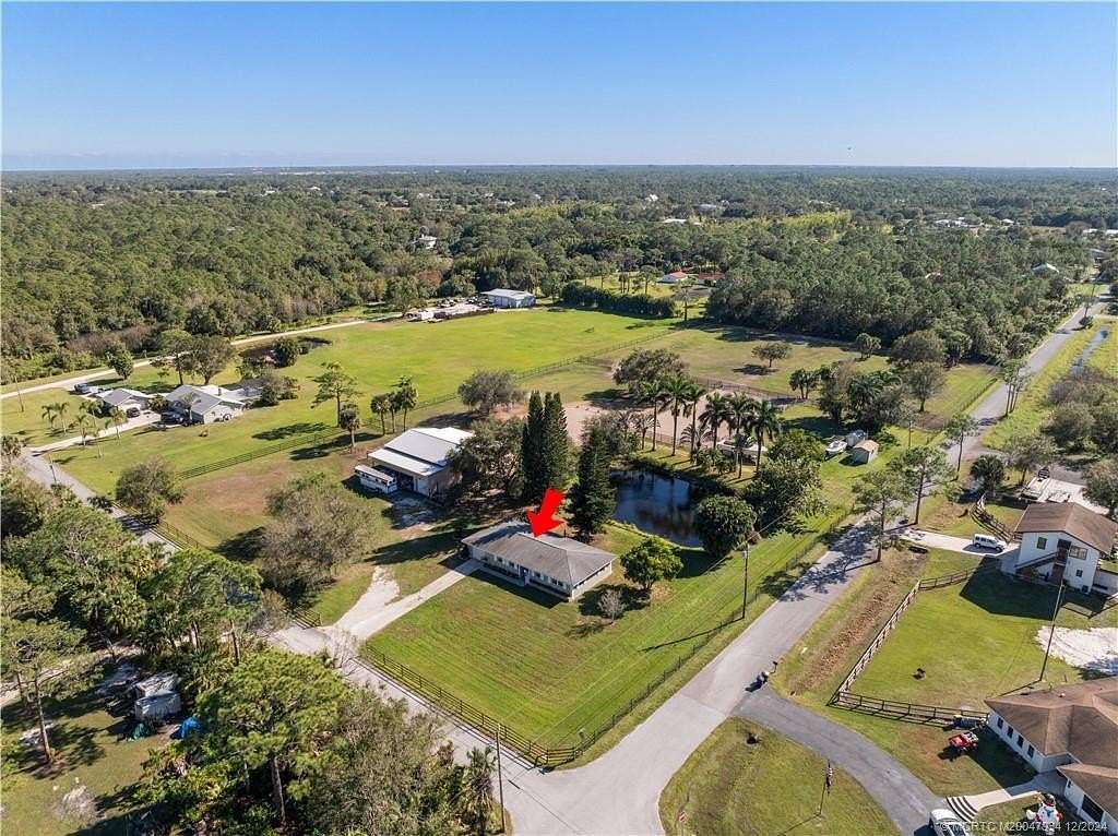 4.67 Acres of Residential Land with Home for Sale in Palm City, Florida