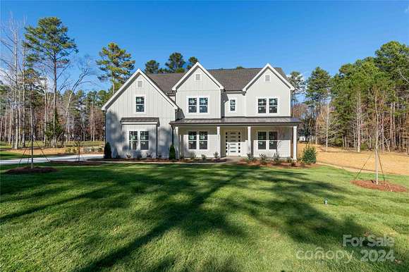 2.07 Acres of Residential Land with Home for Sale in Matthews, North Carolina