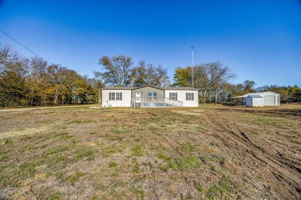 2.044 Acres of Residential Land with Home for Sale in Honey Grove, Texas