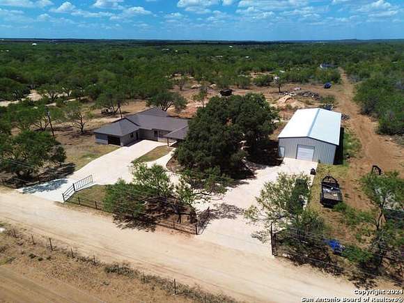 5.208 Acres of Residential Land with Home for Sale in Devine, Texas