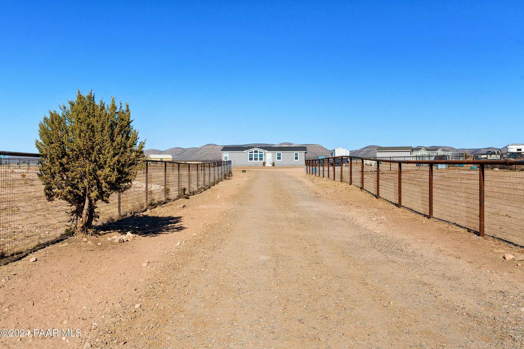 2 Acres of Residential Land with Home for Sale in Paulden, Arizona