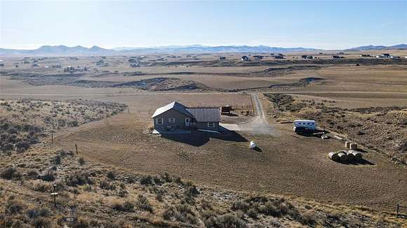 24.001 Acres of Agricultural Land with Home for Sale in Three Forks, Montana