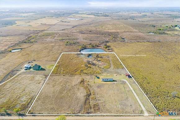 10.35 Acres of Land with Home for Sale in Buckholts, Texas