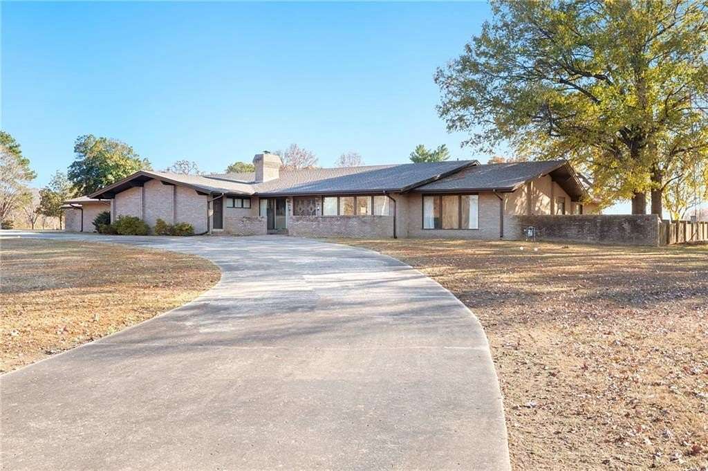 6.13 Acres of Residential Land with Home for Sale in Gravette, Arkansas