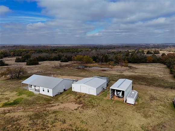 26.1 Acres of Agricultural Land with Home for Sale in Ben Franklin, Texas