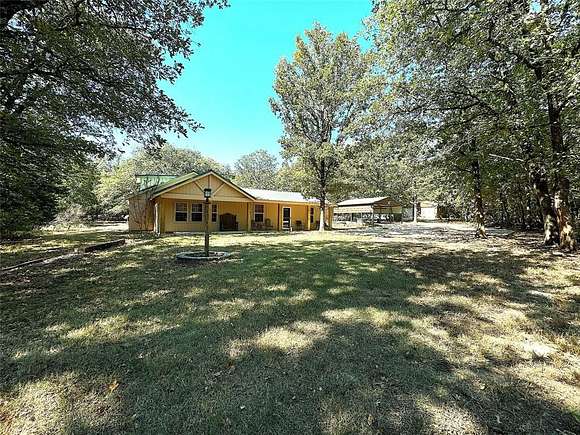 2.68 Acres of Residential Land with Home for Sale in Scroggins, Texas