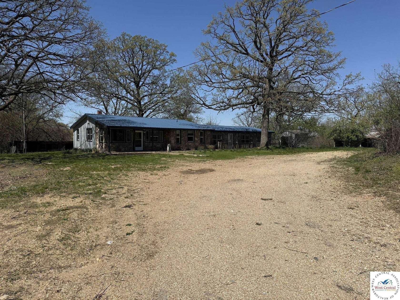 216 Acres of Agricultural Land with Home for Sale in Edwards, Missouri