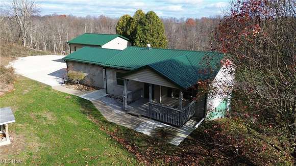 7.97 Acres of Residential Land with Home for Sale in Kimbolton, Ohio