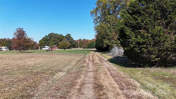 11.48 Acres of Land with Home for Sale in Liberty, North Carolina